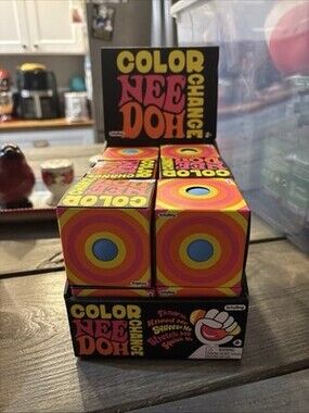 NEE DOH COLOR CHANGE BALLS PINK YELLOW AND BLUE LOT OF 12 PLUS THE DISPLAY BOX
